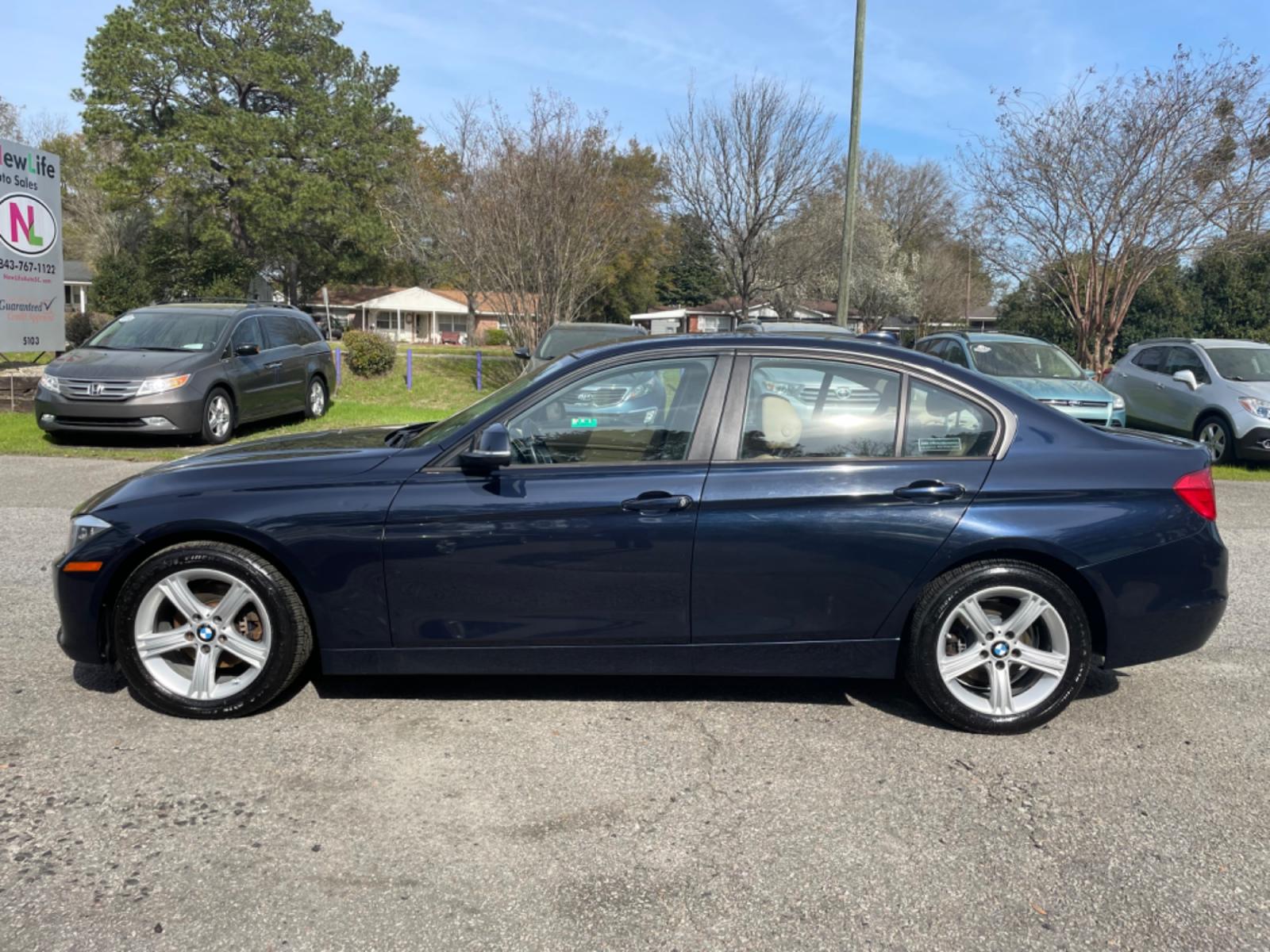 2014 BLUE BMW 3 SERIES 320I XDRIVE (WBA3C3G54EN) with an 2.0L engine, Automatic transmission, located at 5103 Dorchester Rd., Charleston, SC, 29418-5607, (843) 767-1122, 36.245171, -115.228050 - Local Trade-in with Leather, Sunroof, Navigation, CD/AUX/USB, Hands-free Phone, Dual Climate Control, Power Everything (windows, locks, seats, mirrors), Heated, Seats, Push Button Start, Keyless Entry, Alloy Wheels. Clean CarFax (no accidents reported) 101k miles Located at New Life Auto Sales! 202 - Photo #3